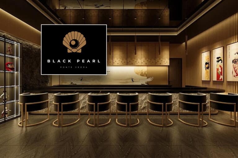 Sleek restaurant interior with inset of logo.