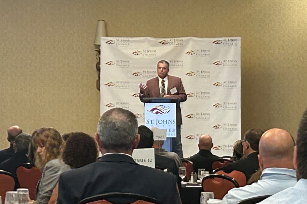 St. Johns County School Superintendent Tim Forson speaking at a breakfast.