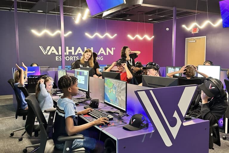 A group of teens plays video games at Valhallan.