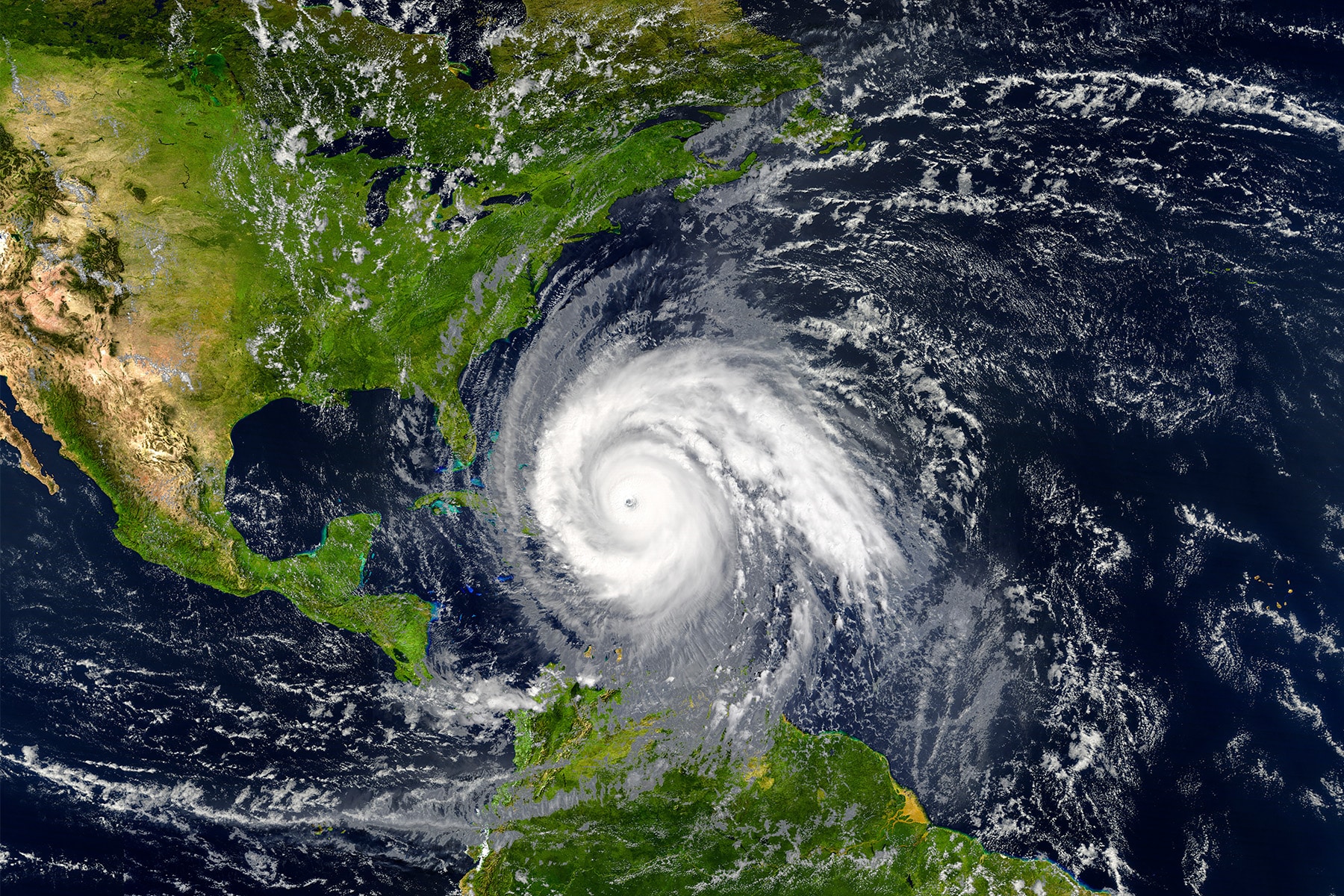 Satellite image of a hurricane swirling in the ocean.