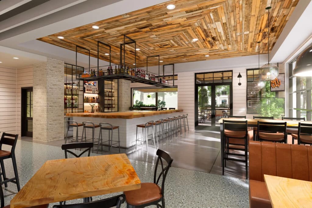 Swanky interior of a restaurant with wood tables and a wood ceiling.