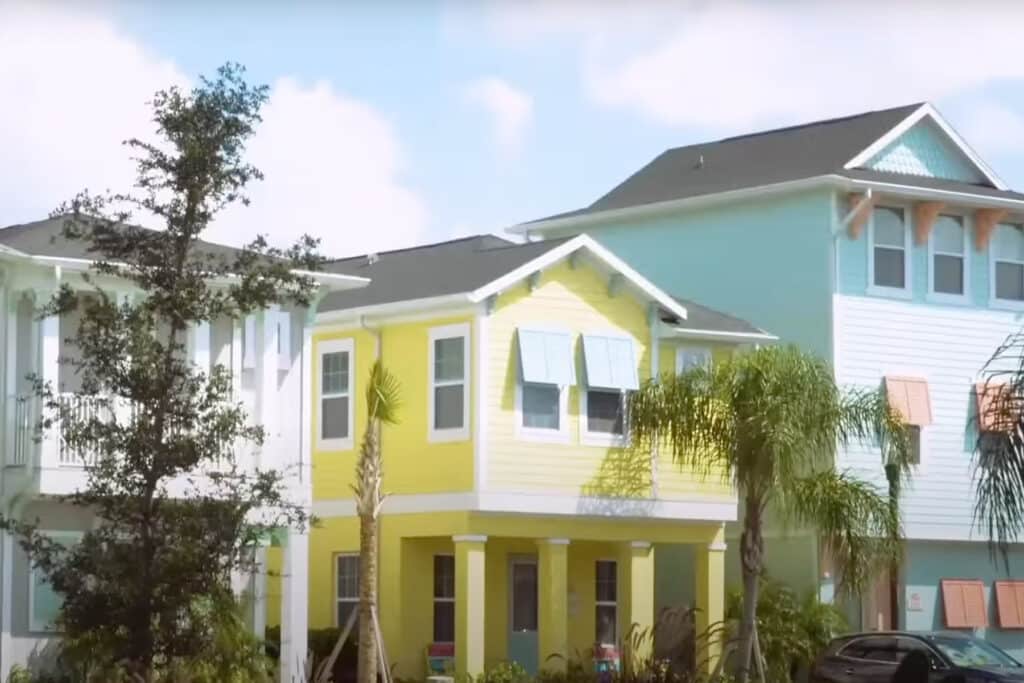 Yellow and blue two-story homes.