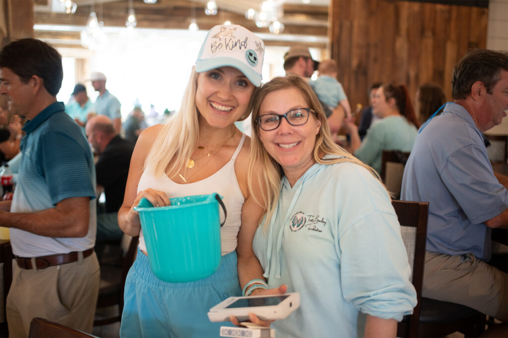 Mother and daughter at an event.