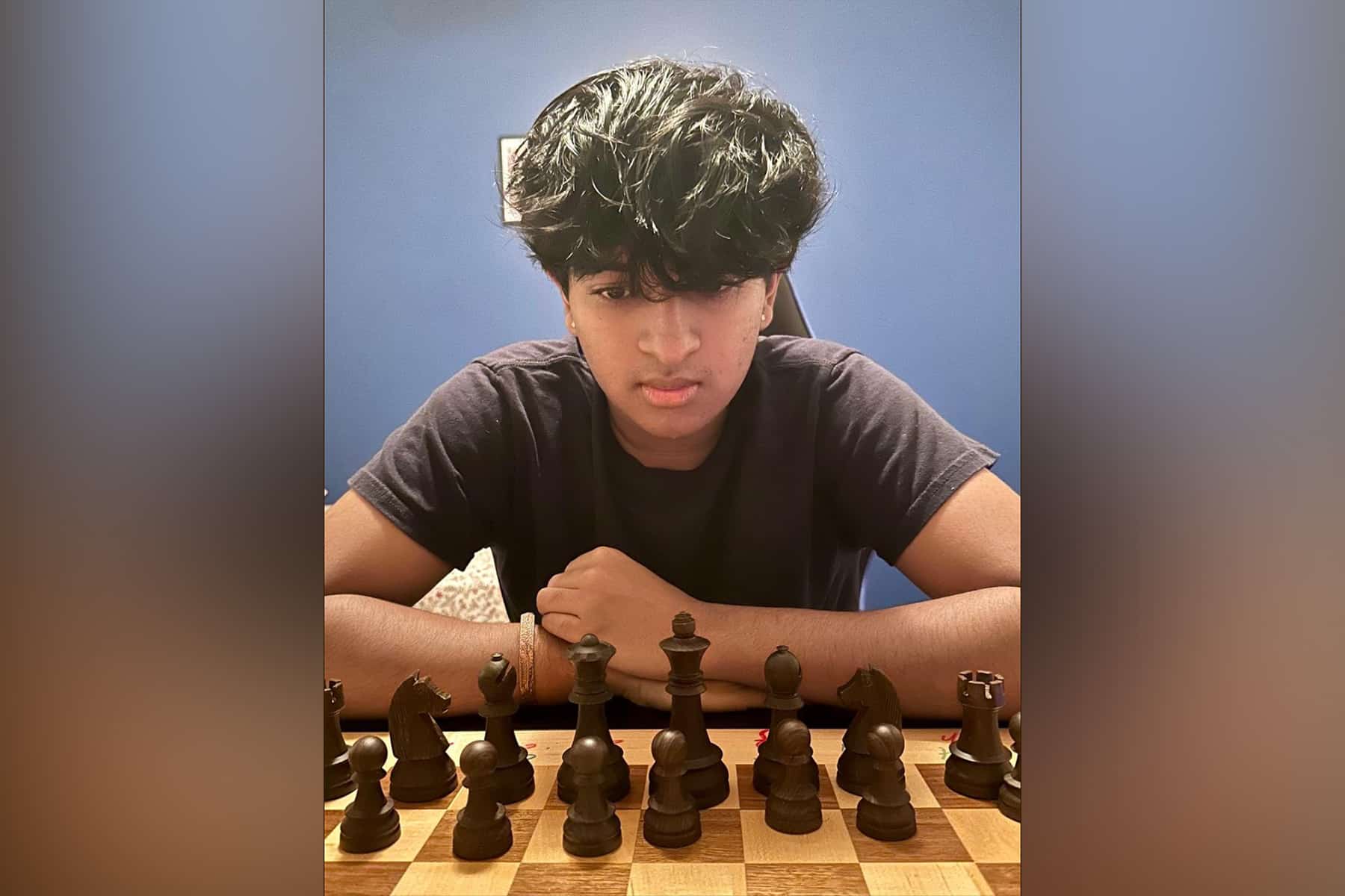 kid playing chess