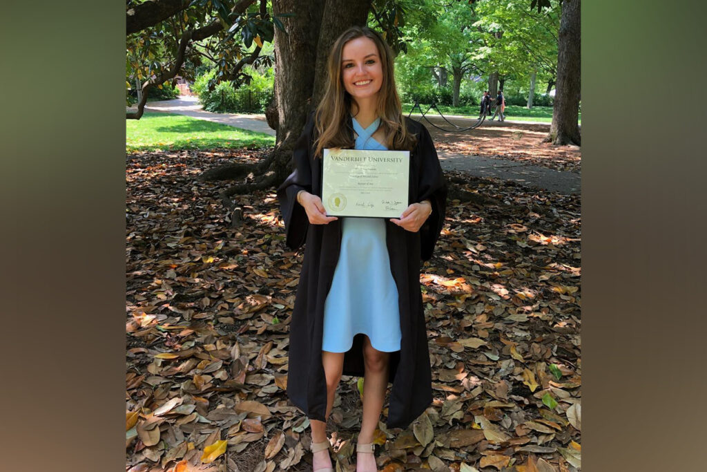 picture of a girl holding a diploma