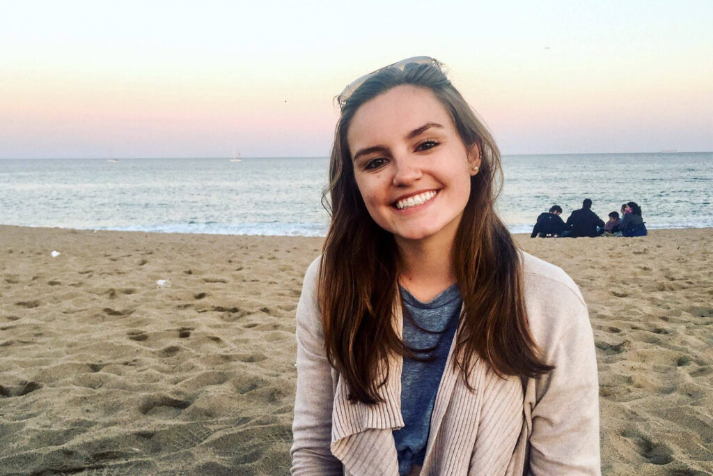 A picture of a woman on the beach