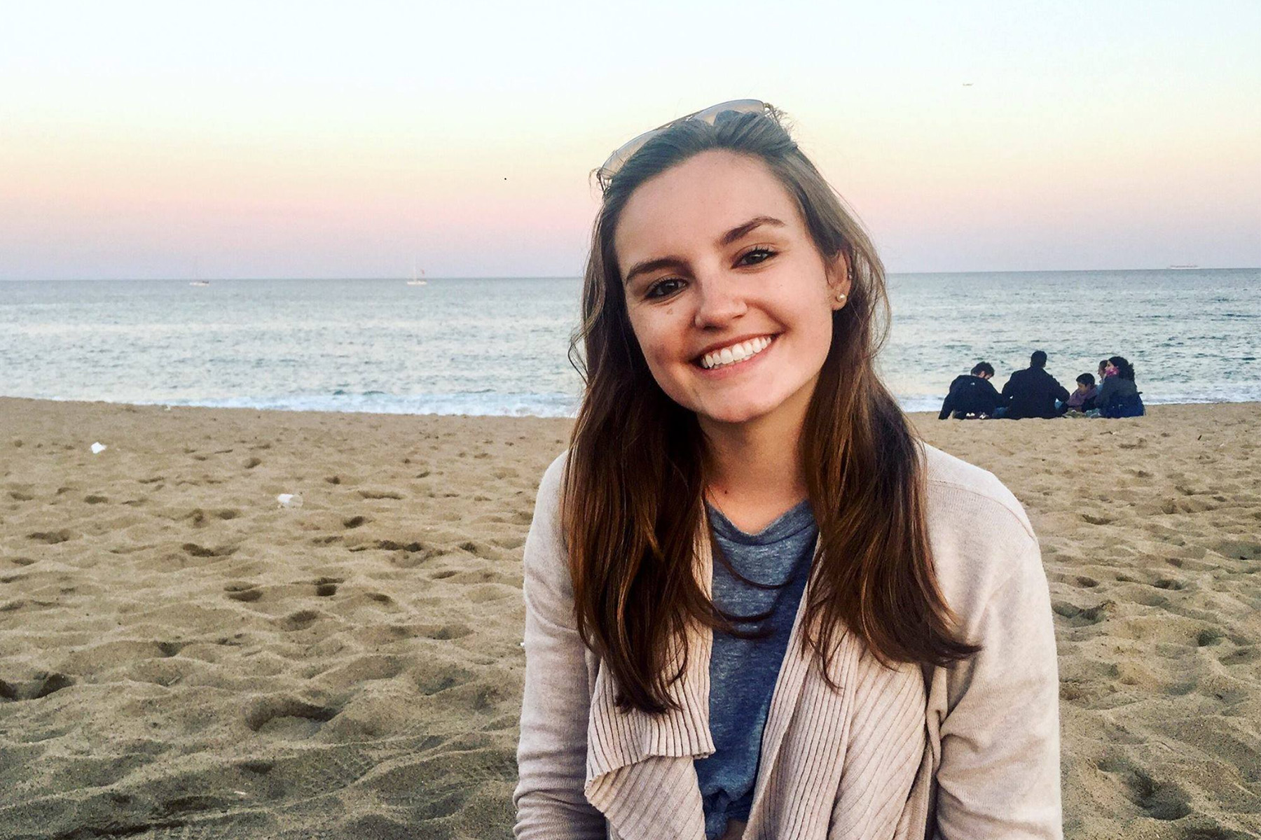 A picture of a woman on the beach