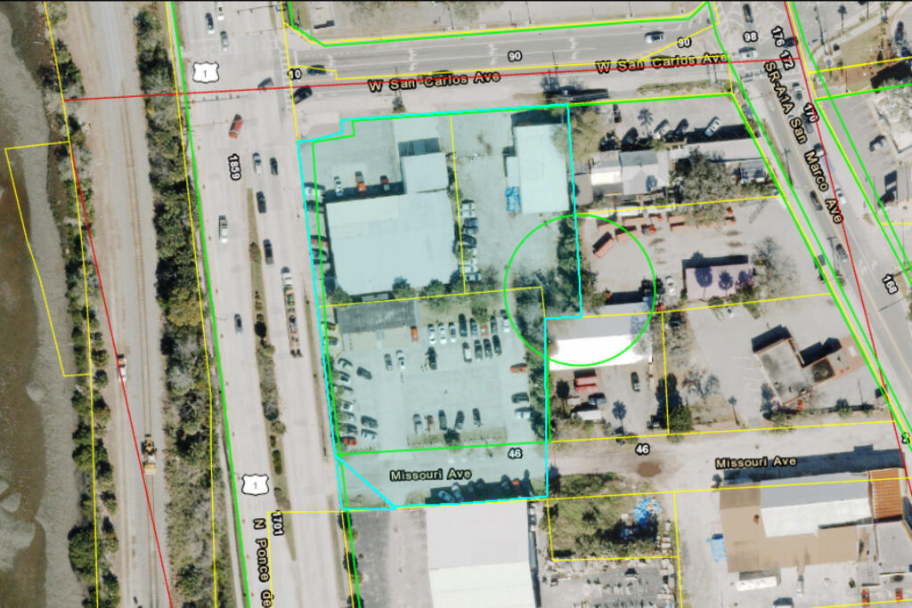 An aerial map with a blue overlay showing the location of a proposed hotel.