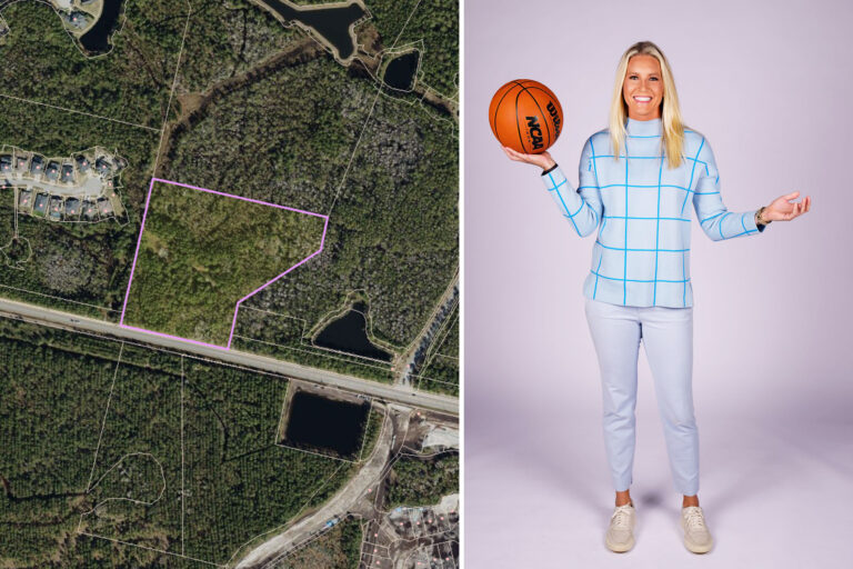 Woman holds a basketball in front of a pink background.