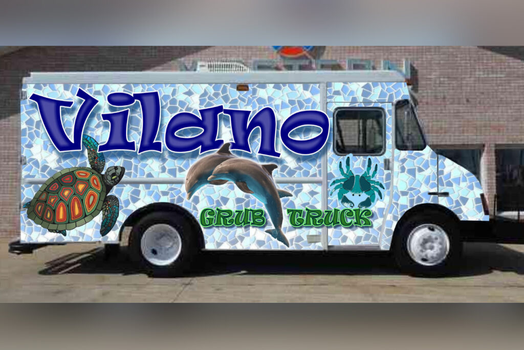 Box truck that has Vilano written in blue with dolphins and a turtle.