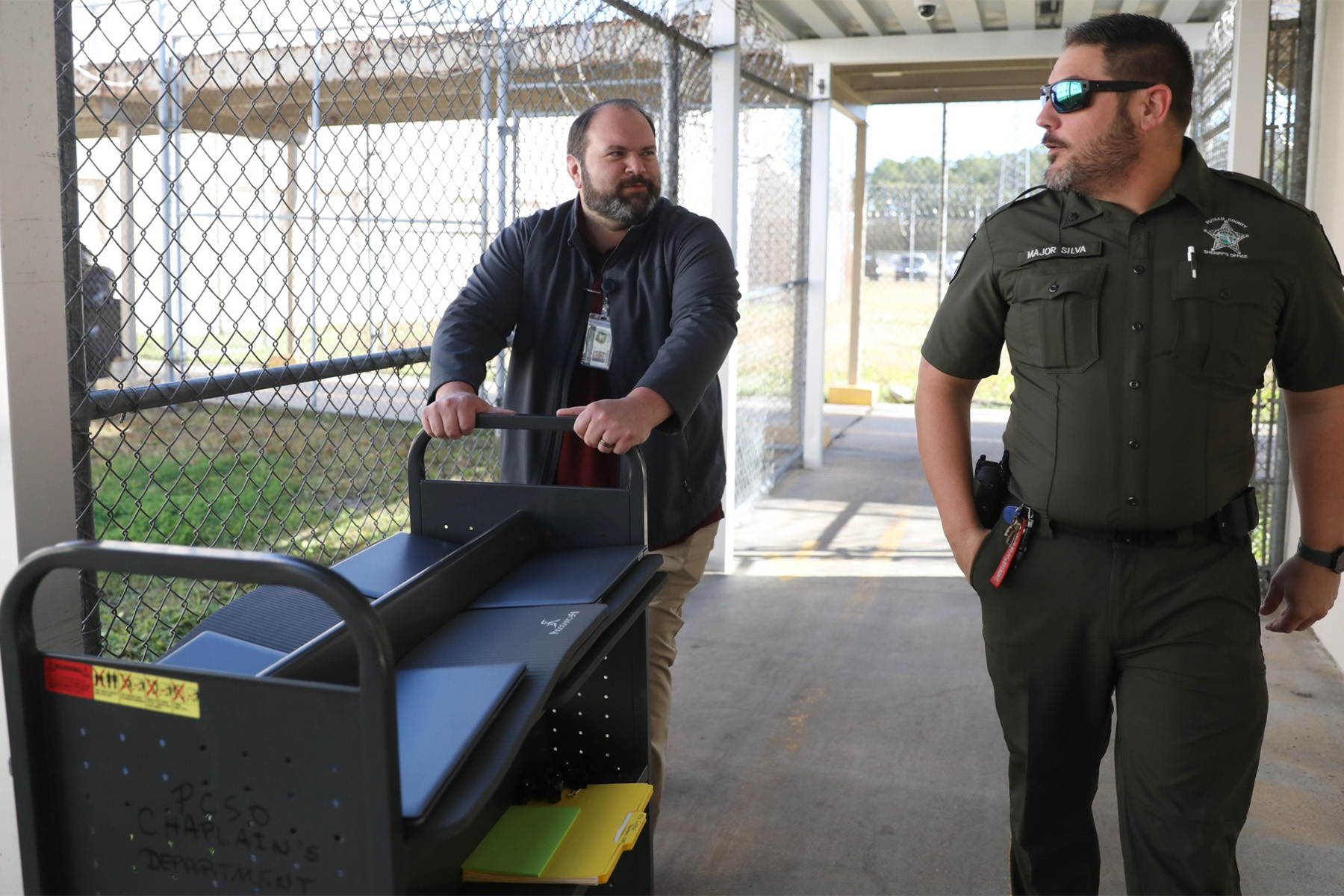 Picture of a teacher going to class in a Florida jail.