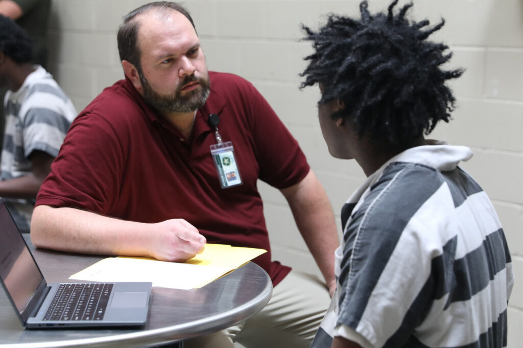Teacher and student in a jail classroom