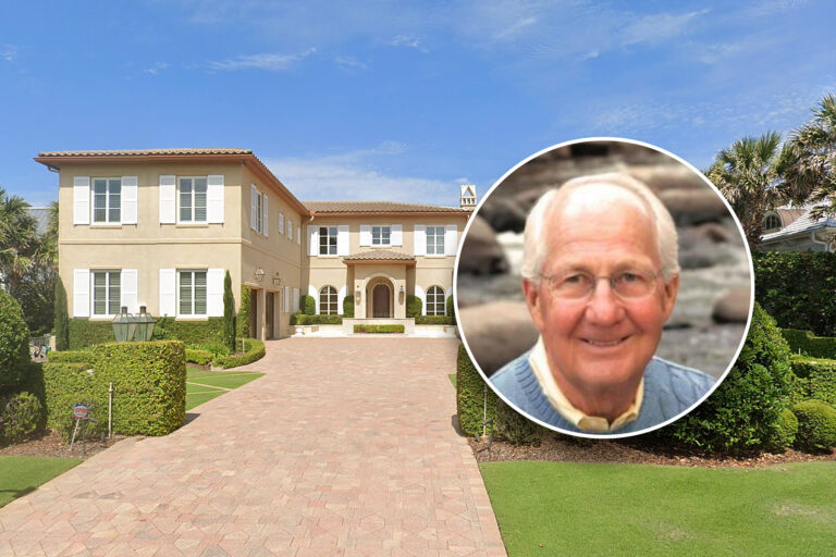 Picture of a man in front of a mansion