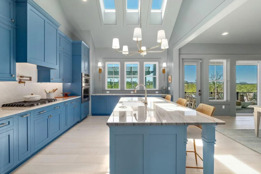 Light filled blue and white kitchen.