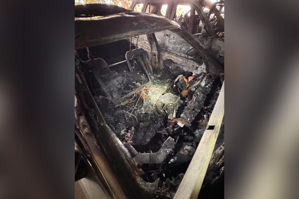 Interior of a charred car at the Jacksonville International Airport after fire.