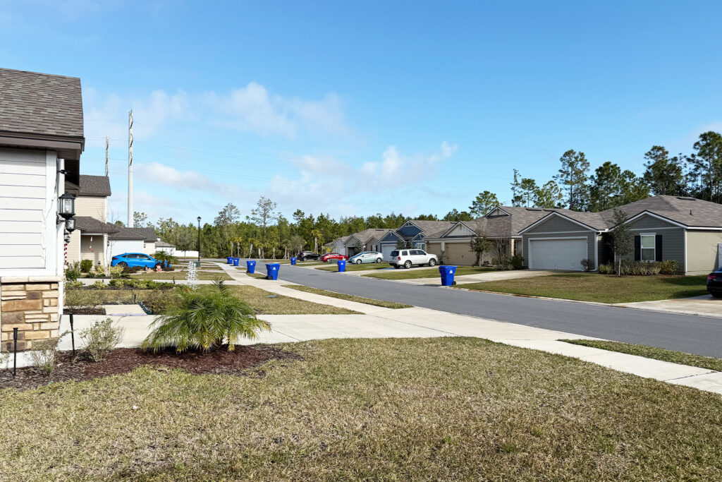 View of beige homes in a Florida development near Indianhead Biomass Services' treatment facility in St. Augustine.