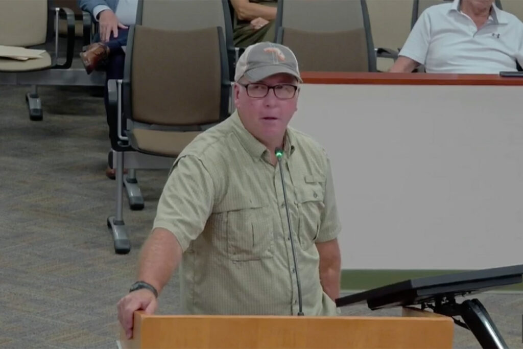 Man speaking at meeting