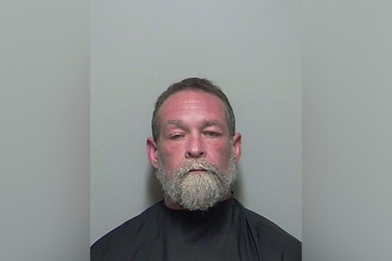 Mugshot of middle aged man